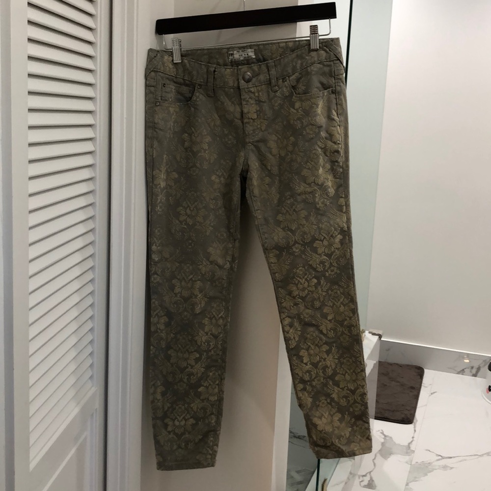 Free People jeans with gold embroidered designs